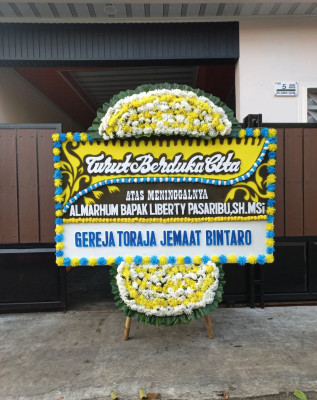 Papan Bunga Duka di Widodomartani